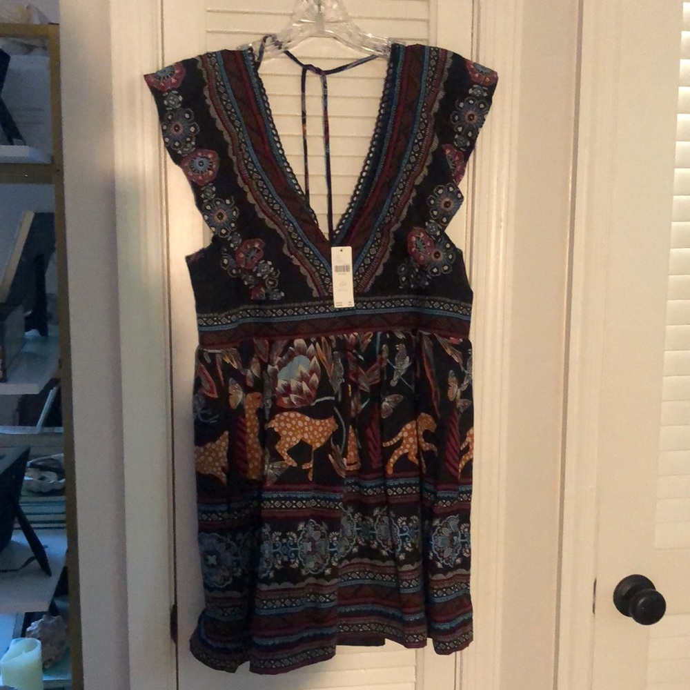 Anthro black printed mini dress XSP